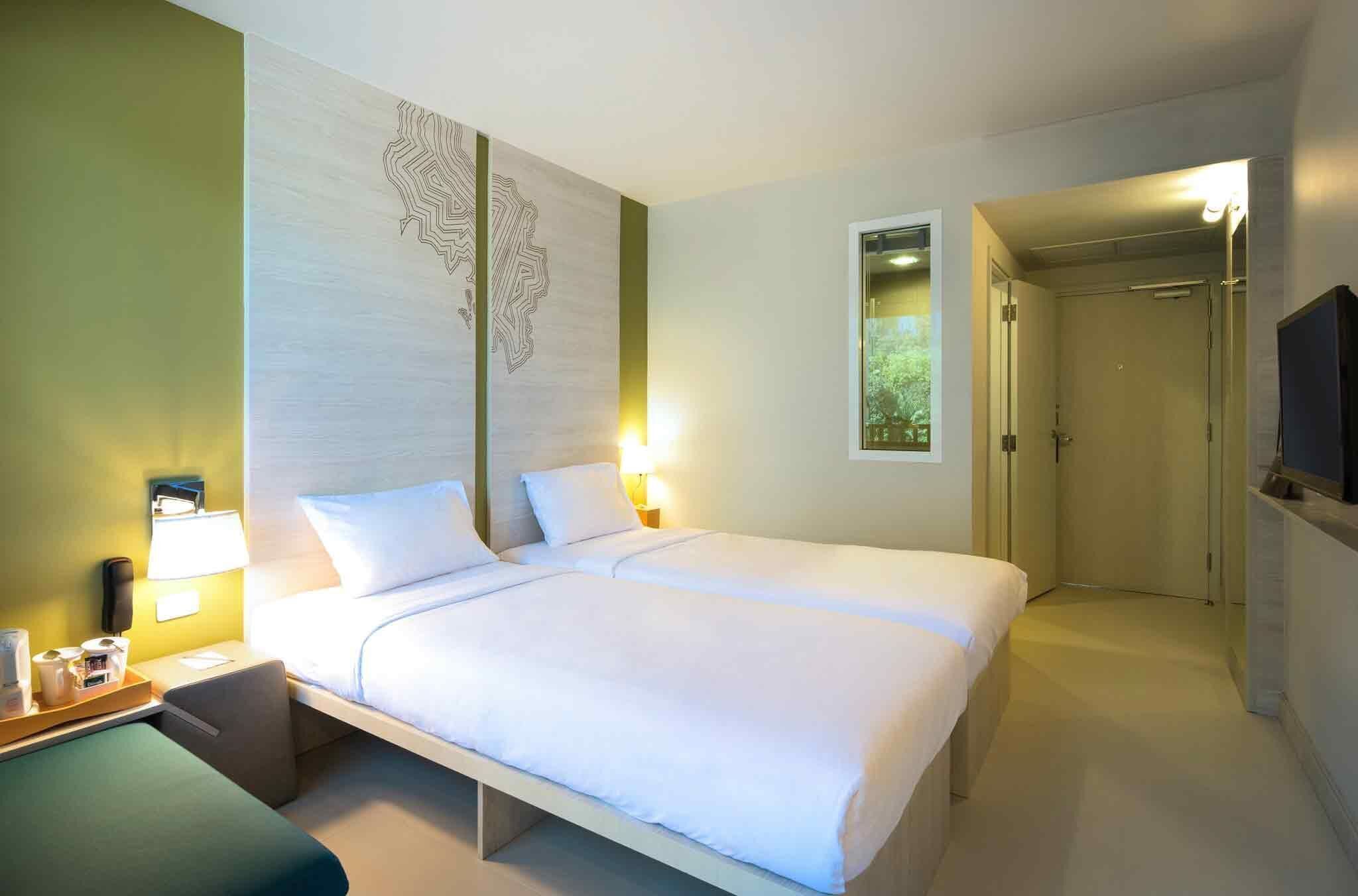 Habitación estándar, 2 camas individuales | Caja fuerte, tabla de planchar con plancha, cunas gratuitas