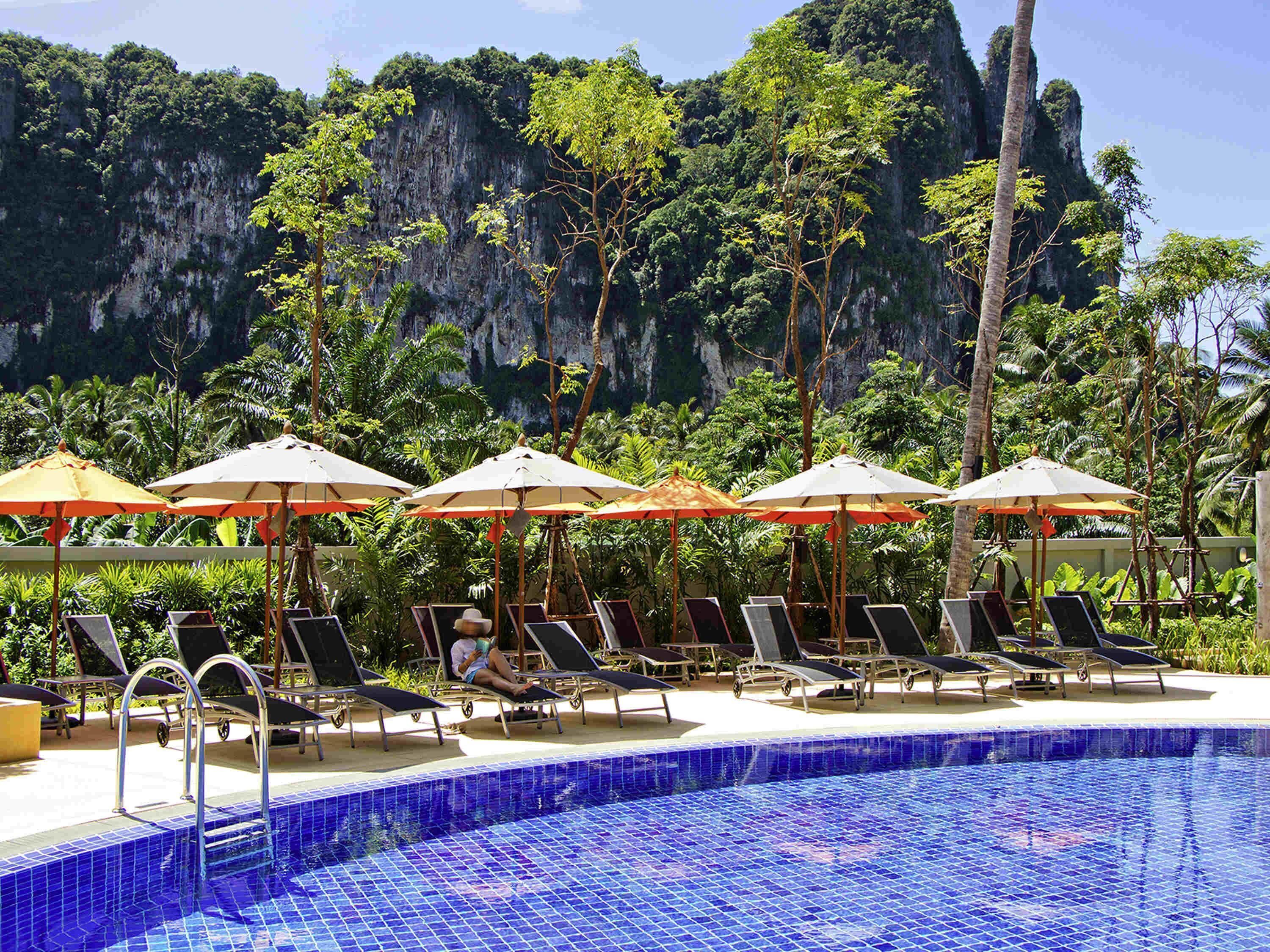 Outdoor pool, open 8:00 AM to 7:00 PM, pool umbrellas, pool loungers