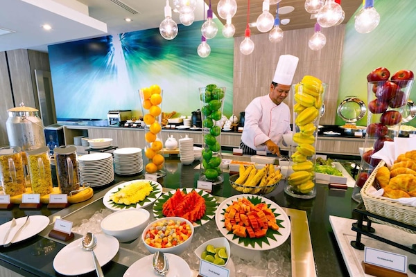 Breakfast, lunch, dinner served; international cuisine