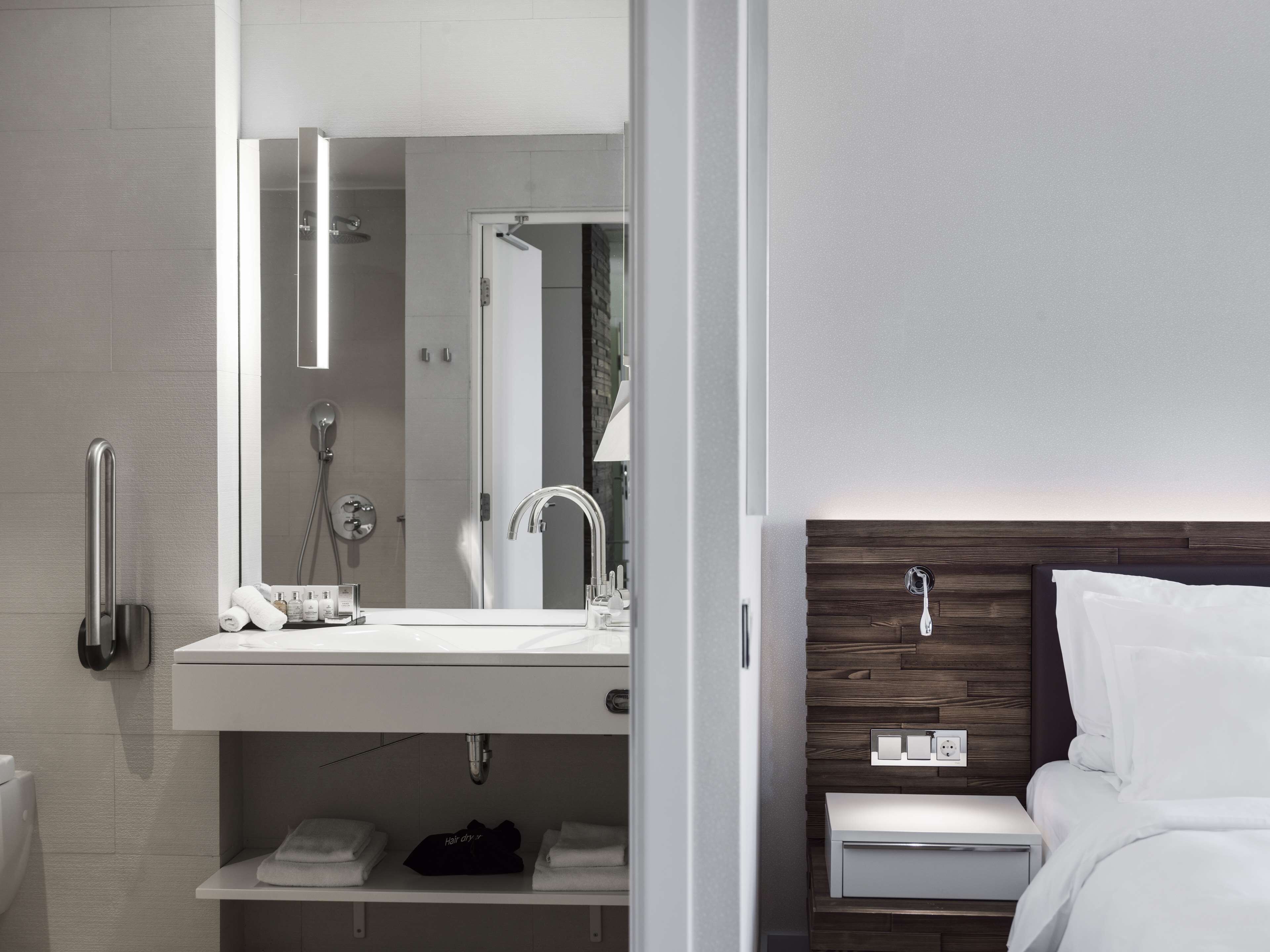 eco-friendly toiletries, hair dryer, bathrobes, slippers