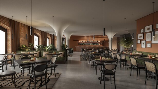 A spacious restaurant with high ceilings, exposed brick walls, and a central bar area. - Radisson Collection Hotel, Old Mill Belgrade (Belgrade)