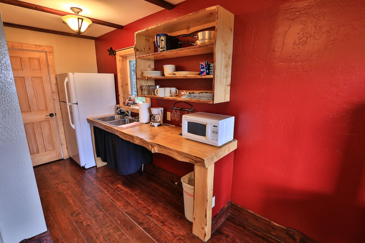 full-sized fridge, microwave, coffee/tea maker, electric kettle