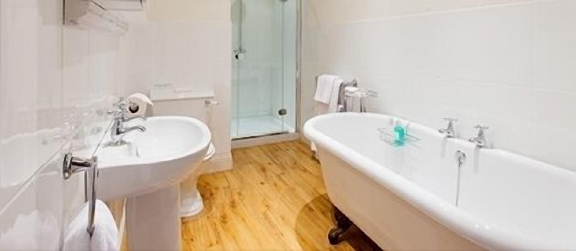 classic double room, mountain view | bathroom | designer toiletries, hair dryer, bathrobes, towels