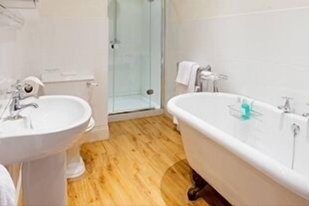 classic double room, mountain view | bathroom | designer toiletries, hair dryer, bathrobes, towels