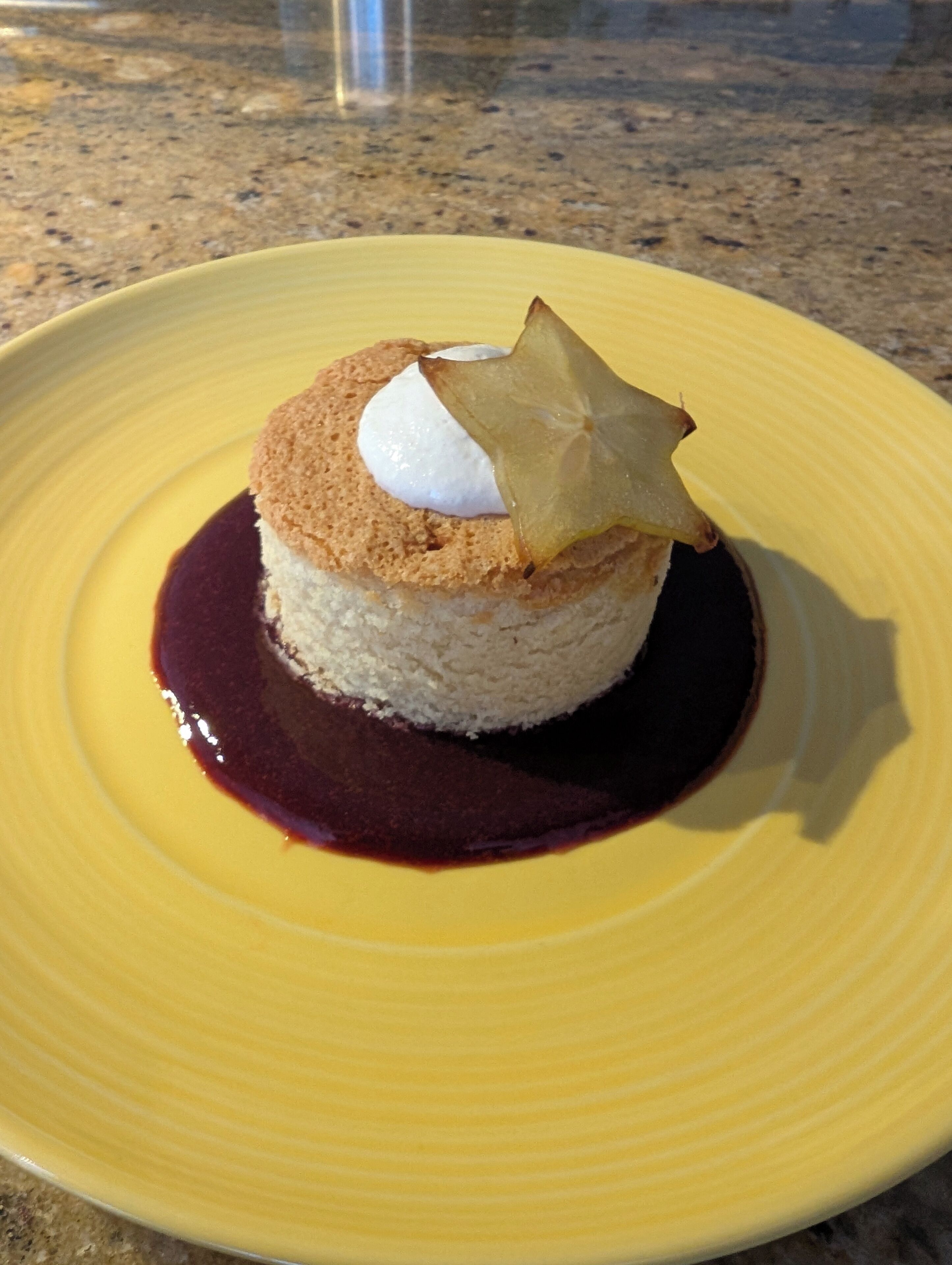 A dessert on a yellow plate.