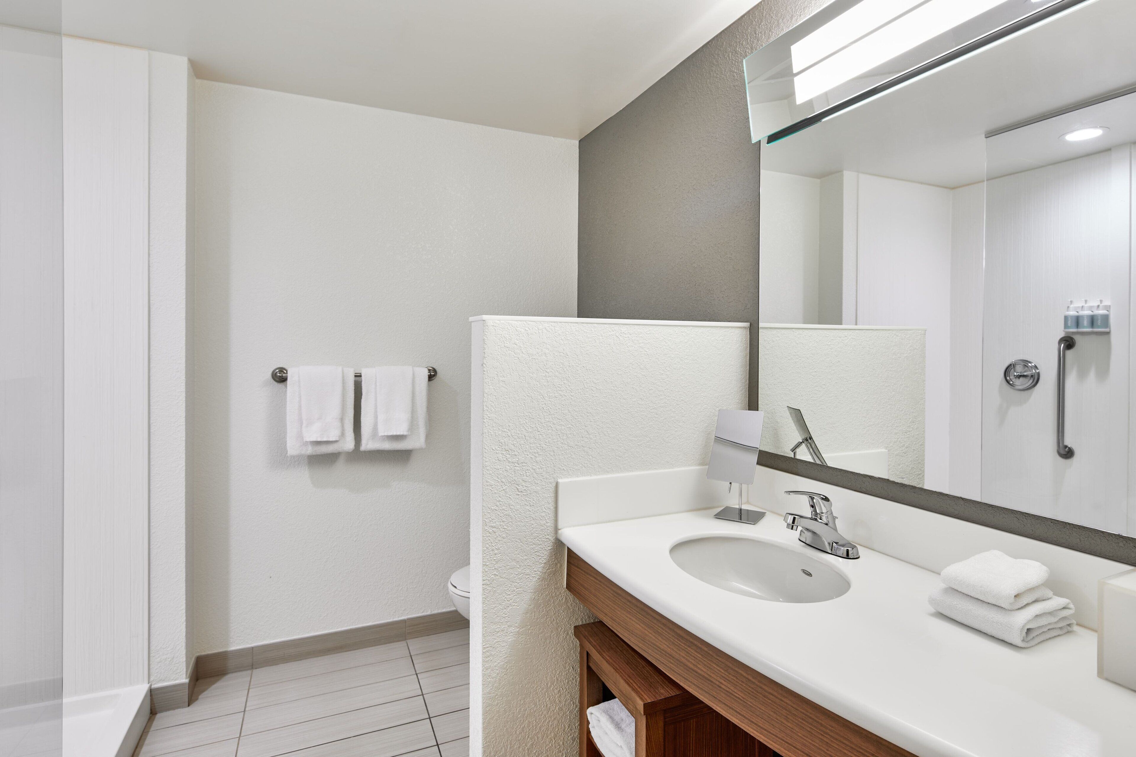 shower, free toiletries, hair dryer, towels