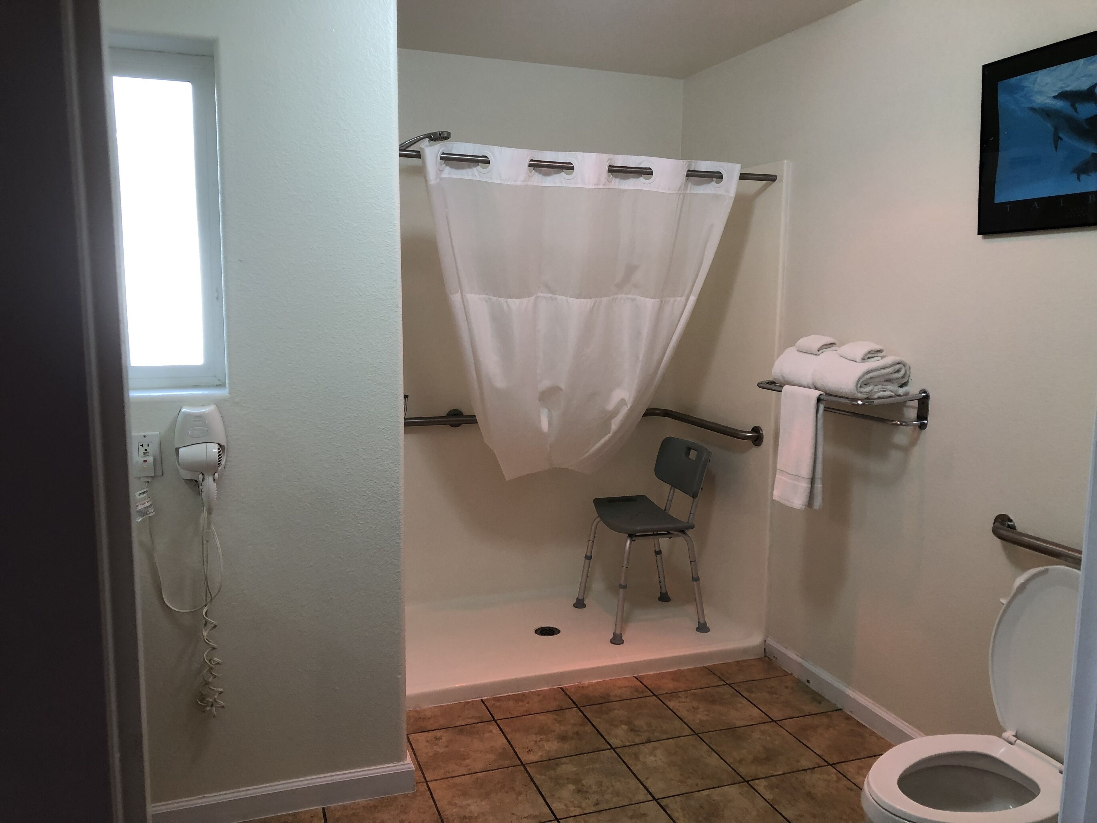 comfort single room, 1 king bed | bathroom | free toiletries, hair dryer, towels, soap