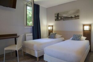 Premium bedding, desk, blackout drapes, iron/ironing board