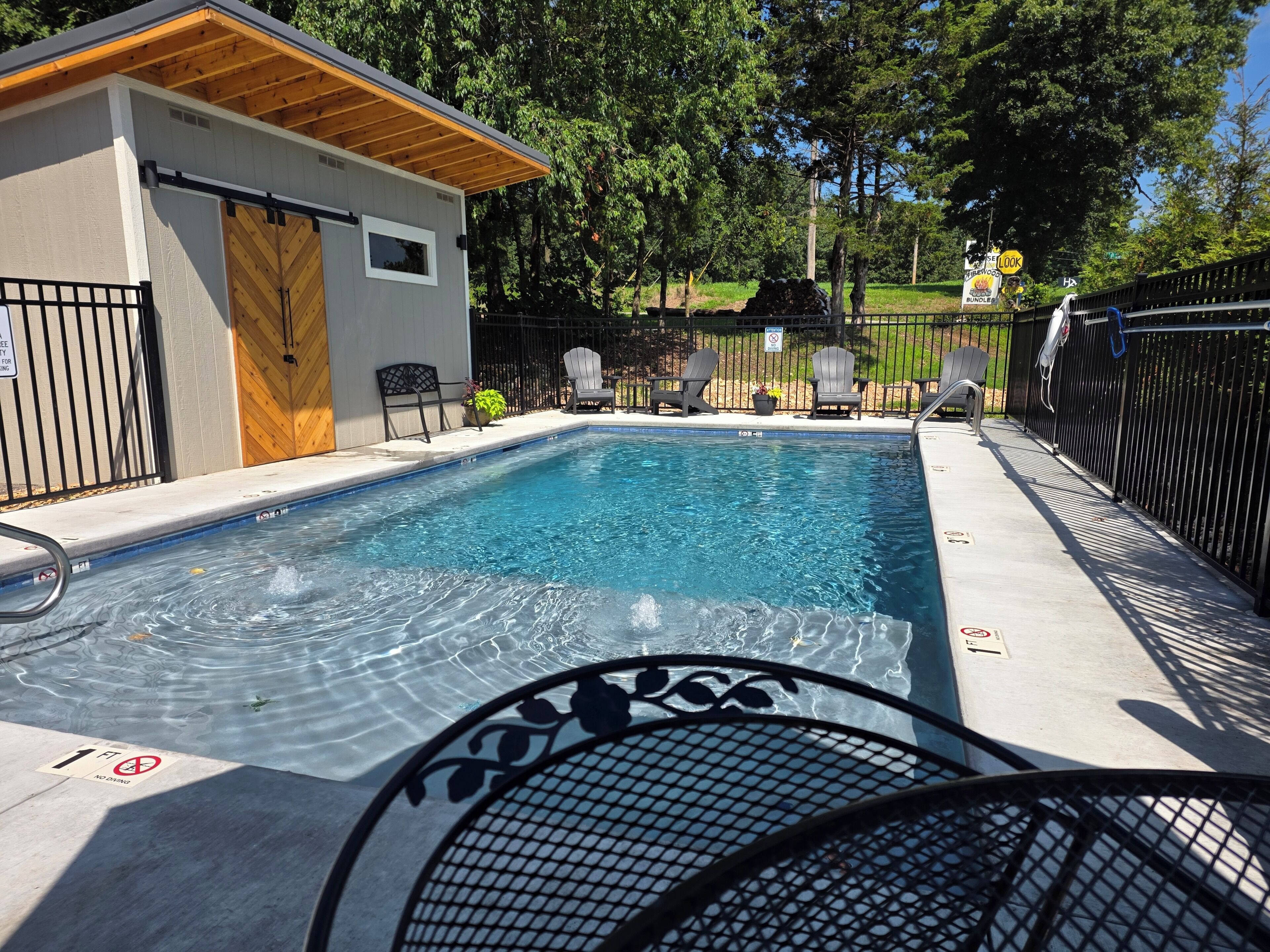 Seasonal outdoor pool, pool umbrellas, pool loungers