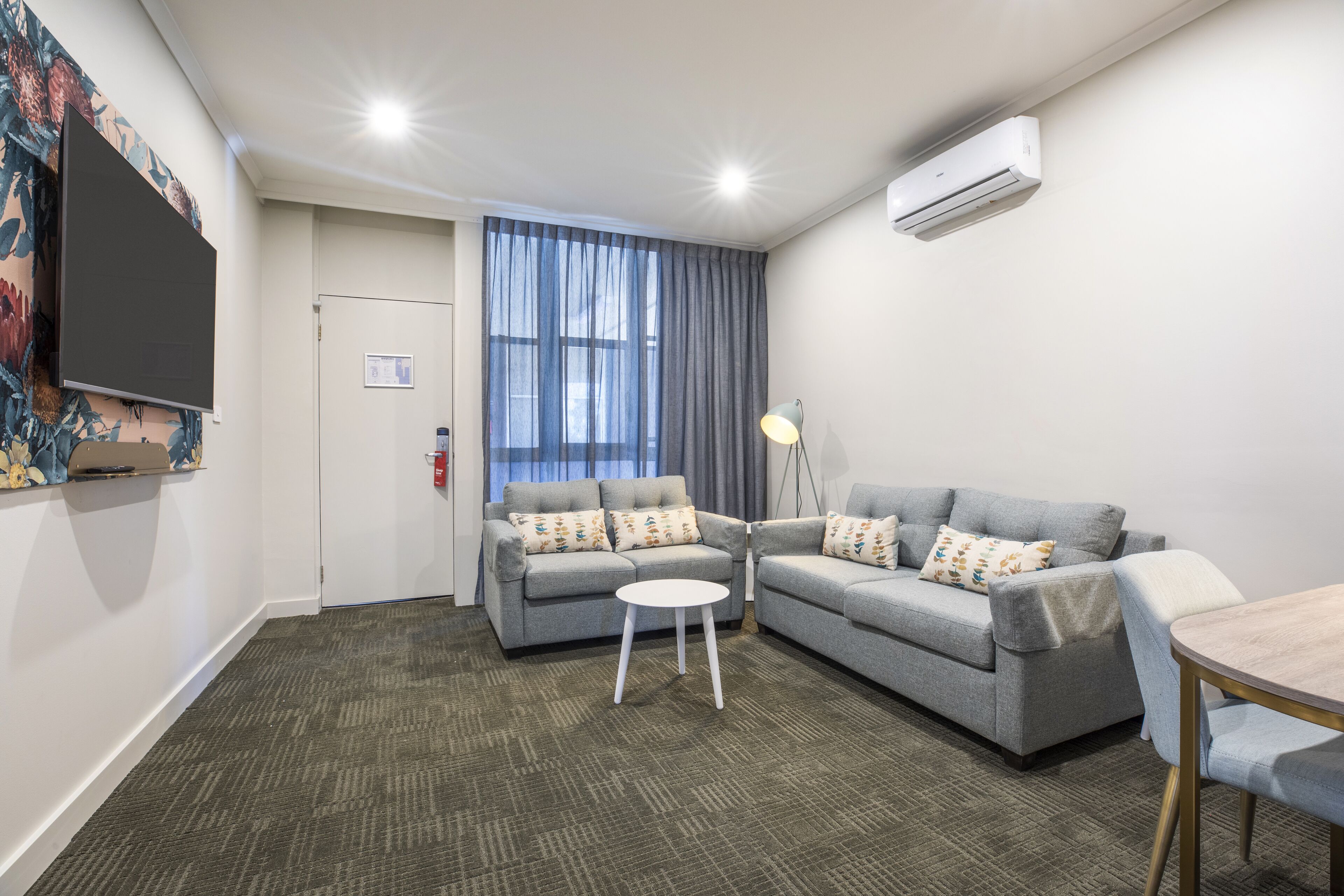 two bedroom apartment | living area | 32-inch lcd tv with cable channels, tv