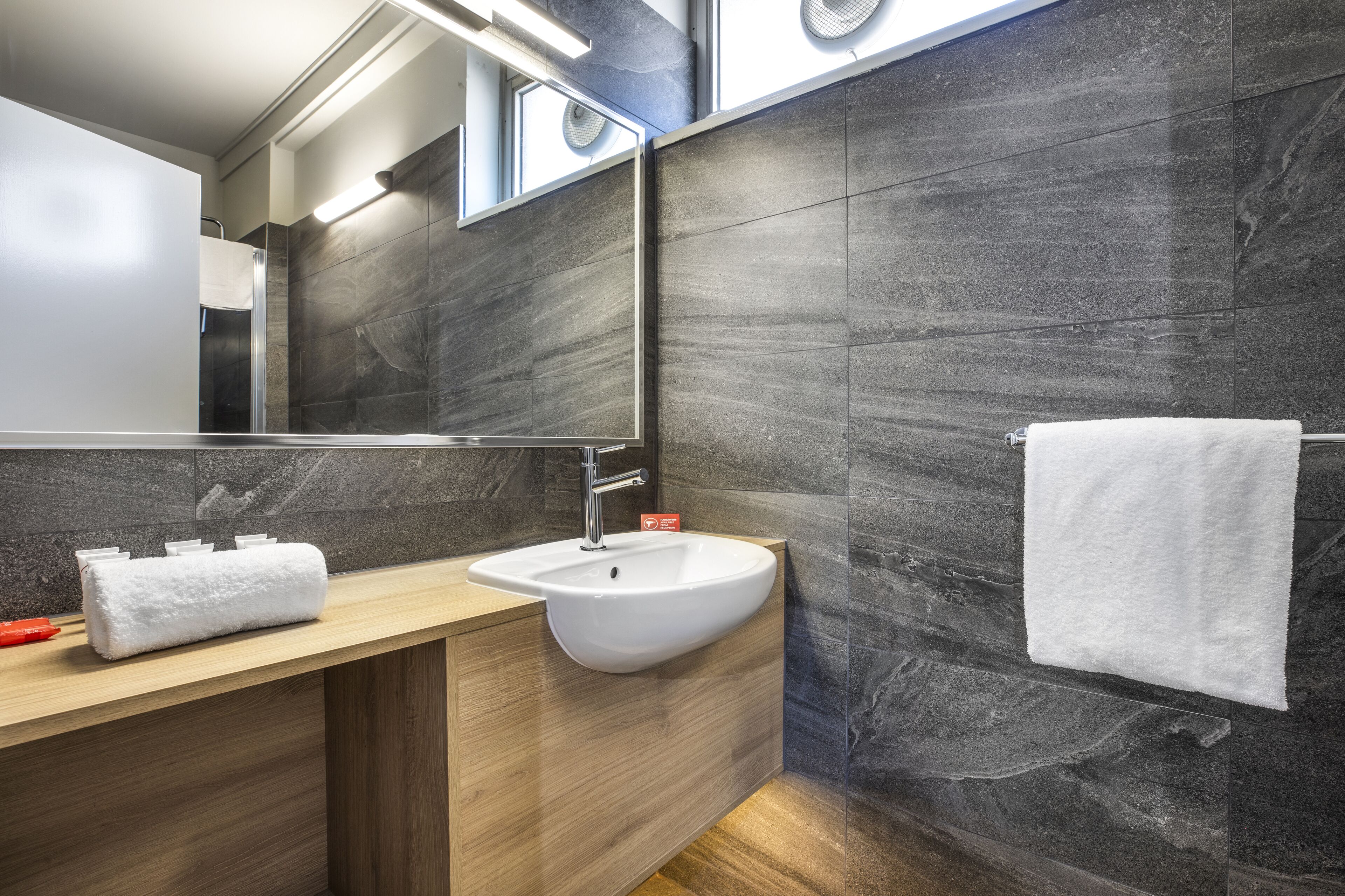 shower, free toiletries, hair dryer, towels