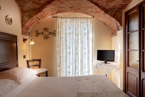 Habitación Confort con 1 cama matrimonial o 2 individuales | Ropa de cama de alta calidad, edredón y decoración personalizada 