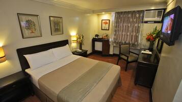 Deluxe Single Room, 1 Queen Bed | Minibar, in-room safe, rollaway beds, free WiFi