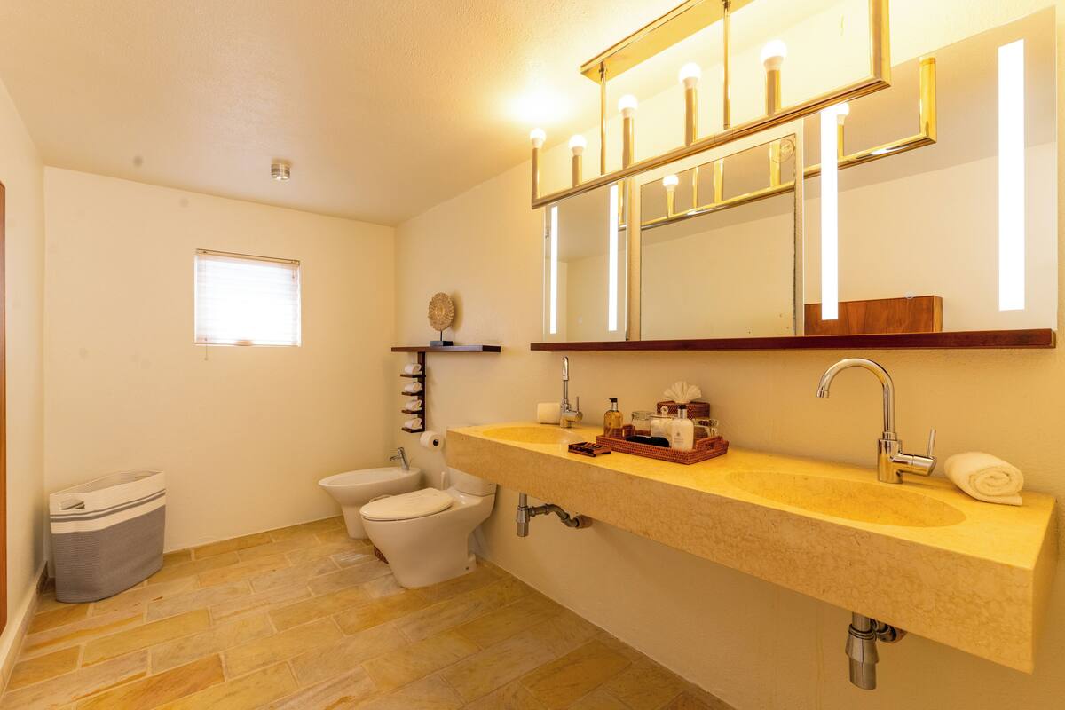 Separate bathtub and shower, deep-soaking bathtub, hair dryer, bathrobes