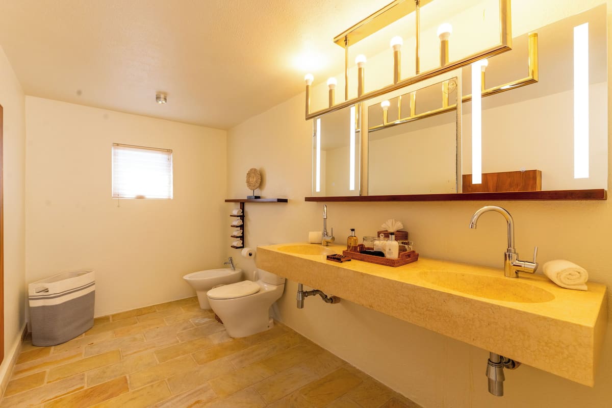 Separate bathtub and shower, deep-soaking bathtub, hair dryer, bathrobes