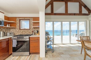 Full-size fridge, microwave, stovetop, dishwasher