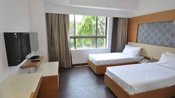 Superior Room | Minibar, in-room safe, individually decorated, individually furnished