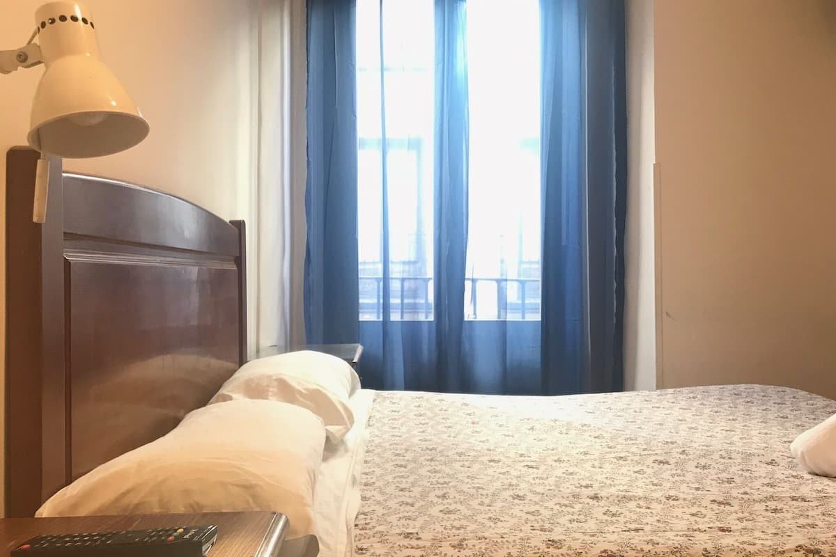 Down comforters, desk, blackout drapes, iron/ironing board (on request)