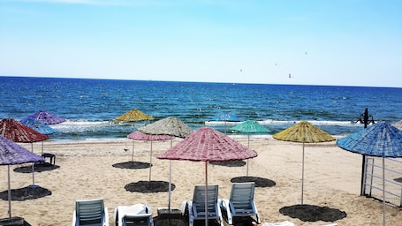 Private beach, sun loungers, beach umbrellas, beach volleyball