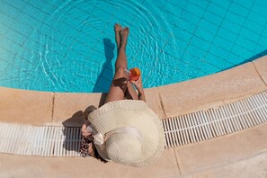Outdoor pool, pool umbrellas, sun loungers