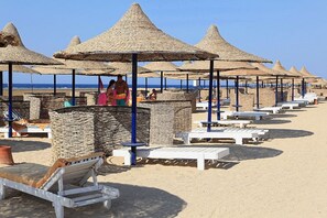 Private beach, sun loungers, beach umbrellas, beach bar - The Three Corners Pensée Beach Resort (MARSA ALAMA- RED SEA)
