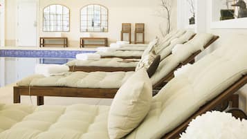 Indoor pool, open 8:00 AM to 10:00 PM, pool loungers