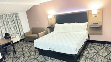 Tabla de planchar con plancha, wifi gratis y ropa de cama