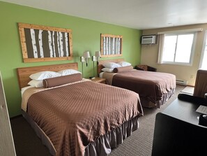 Tabla de planchar con plancha, wifi gratis y ropa de cama 