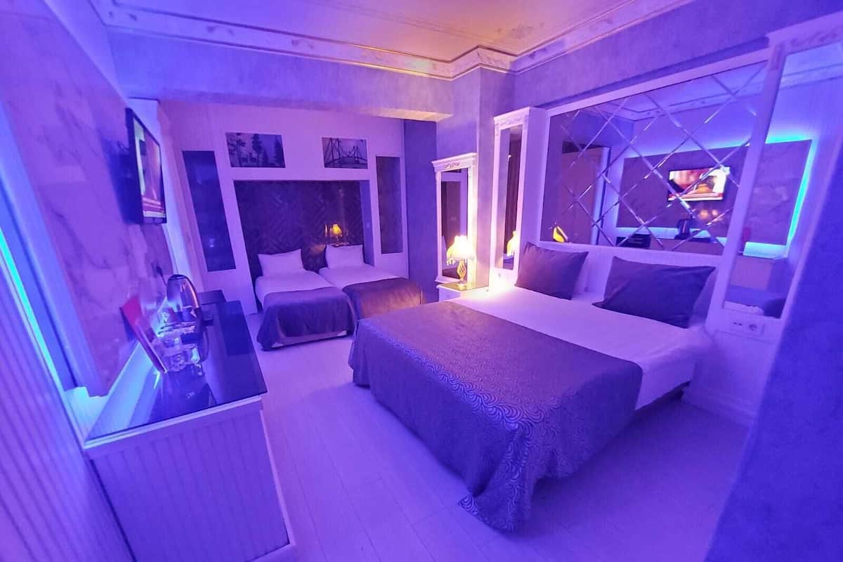 Chambre Quadruple Standard | Literie de qualité supérieure, minibar, coffres-forts dans les chambres