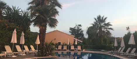 Outdoor pool, pool umbrellas, pool loungers