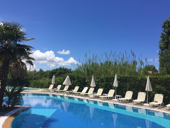 Outdoor pool, pool umbrellas, pool loungers