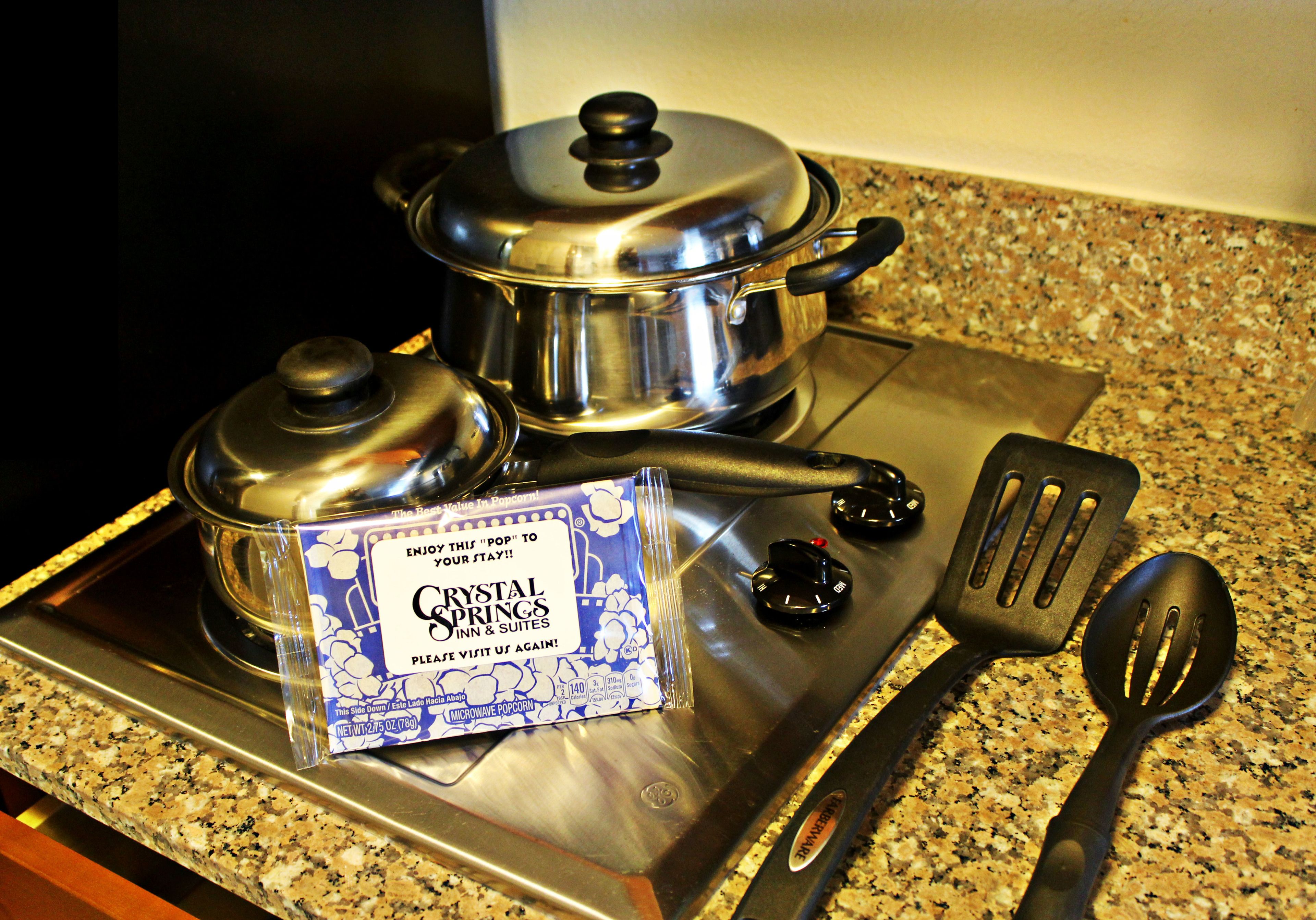 full-sized fridge, microwave, stovetop, coffee/tea maker