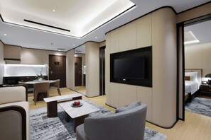 Junior Suite New | Living area | LED TV - The Alts Hotel (Palembang)
