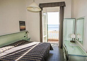 Triple Room, Sea View | In-room safe, desk, free WiFi, bed sheets