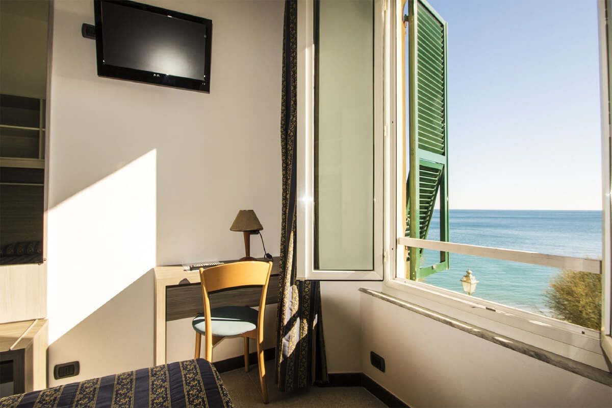 double or twin room, sea view | in-room safe, desk, free wifi, bed sheets