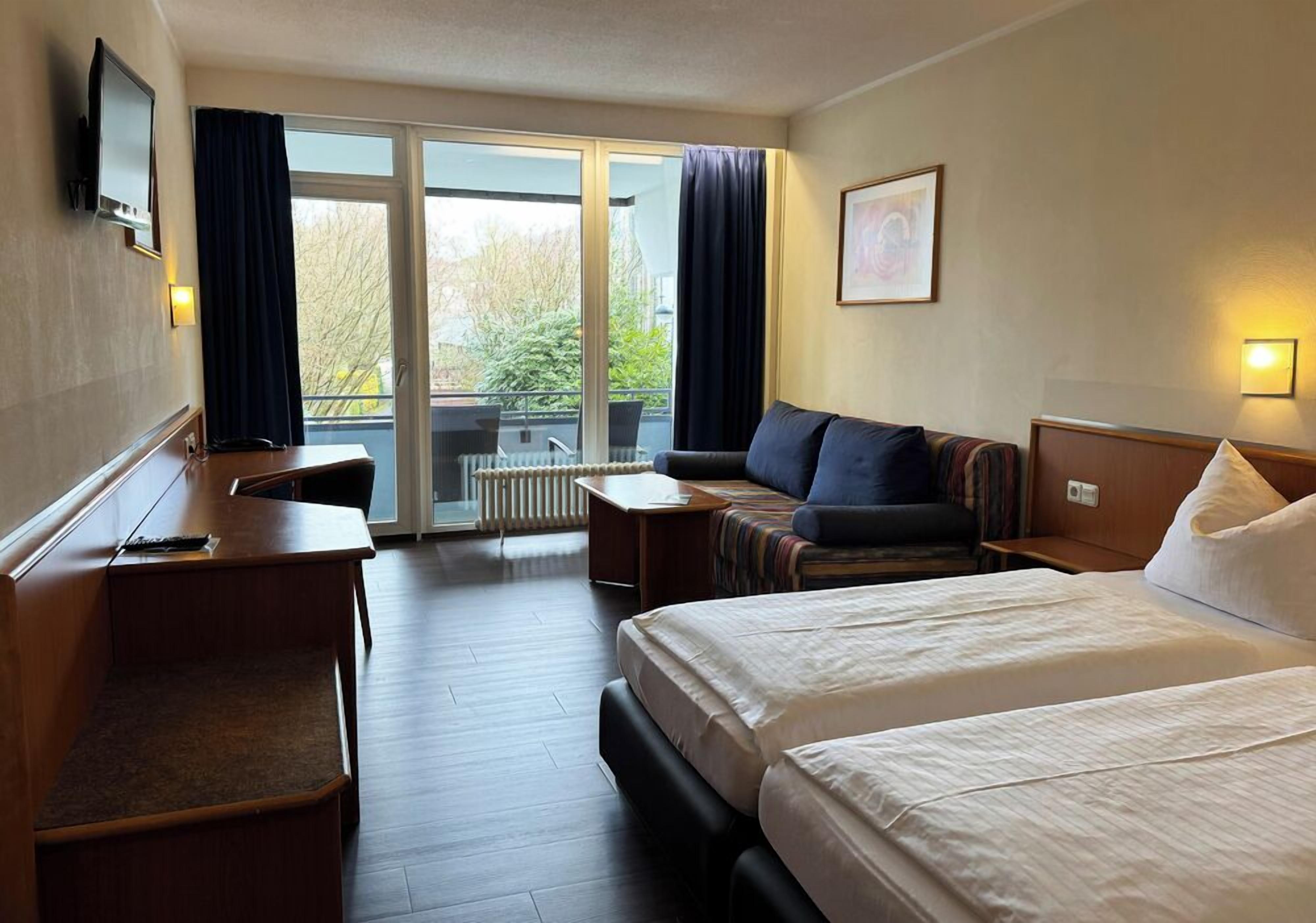 Familieværelse - balkon | Pengeskab på værelset, skrivebord, lydisolering, Wi-Fi (tillægsgebyr)