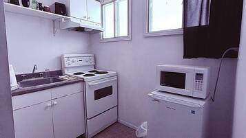 Studio with Sofa Bed and Kitchen | Private kitchen | Fridge, coffee/tea maker, cleaning supplies