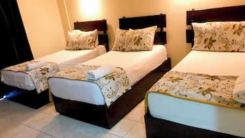 Triple Room | Blackout drapes, iron/ironing board, free WiFi, bed sheets