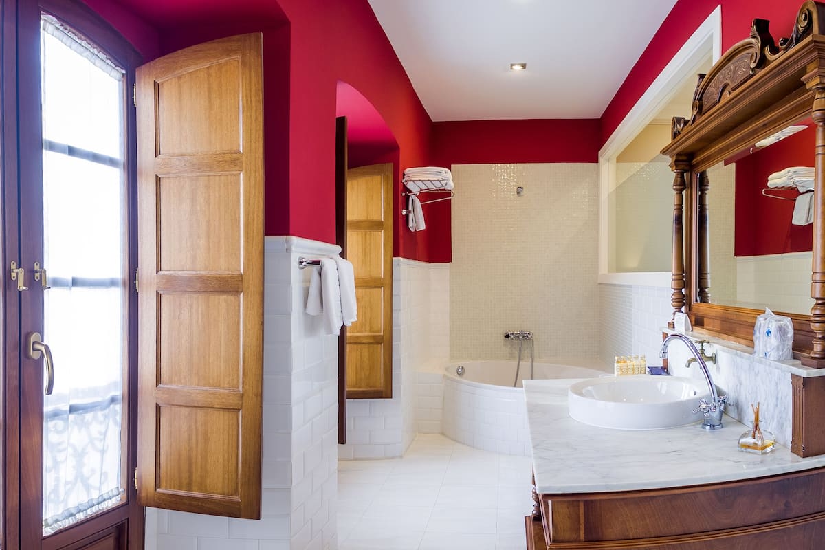 superior double room | bathroom | rainfall showerhead, free toiletries, hair dryer, bidet