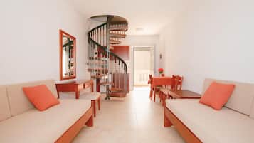 Apartment, 1 Bedroom, Balcony, Sea View | Living area | Flat-screen TV