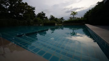 Outdoor pool, pool umbrellas, sun loungers