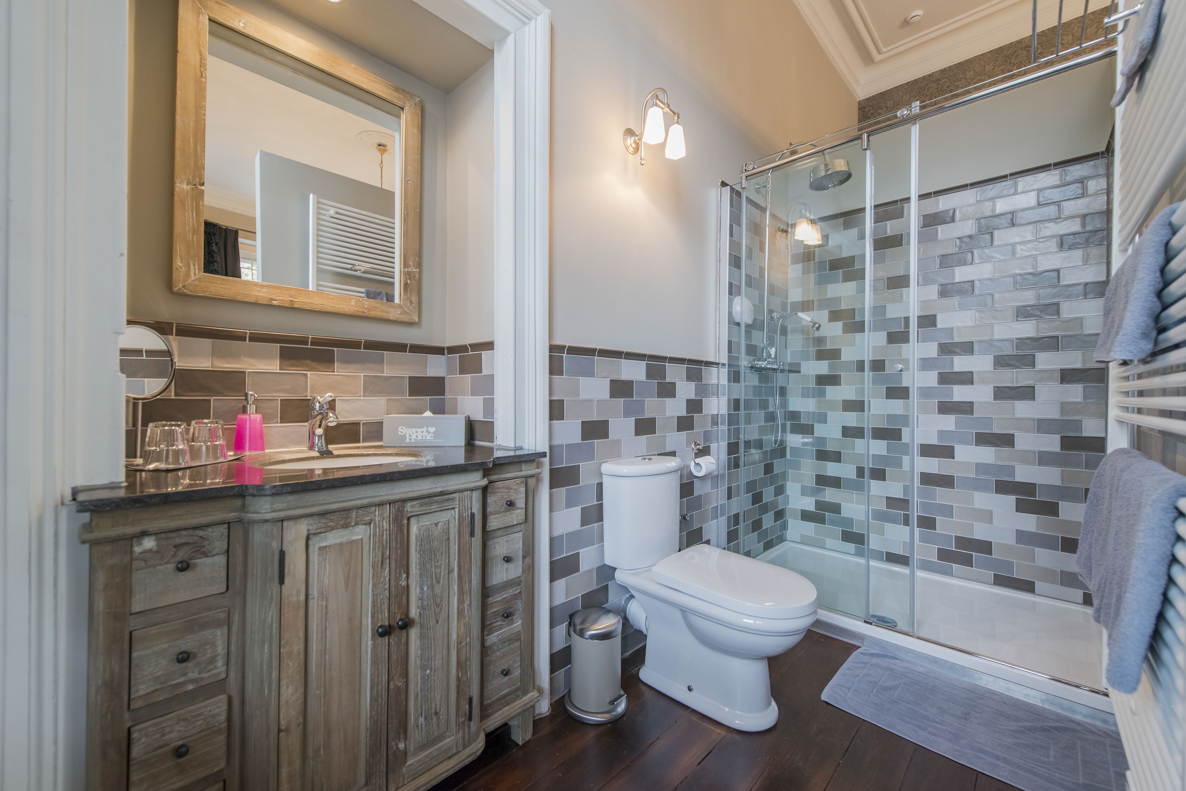 shower, rainfall showerhead, hair dryer, towels