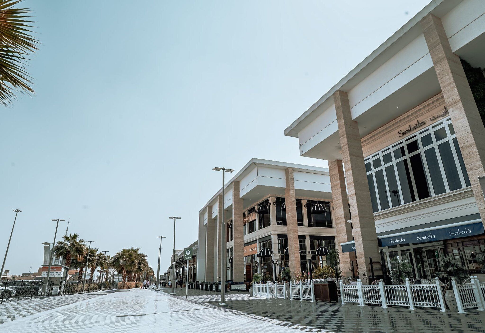 A modern building with a prominent entrance labeled "Sarabeth's."