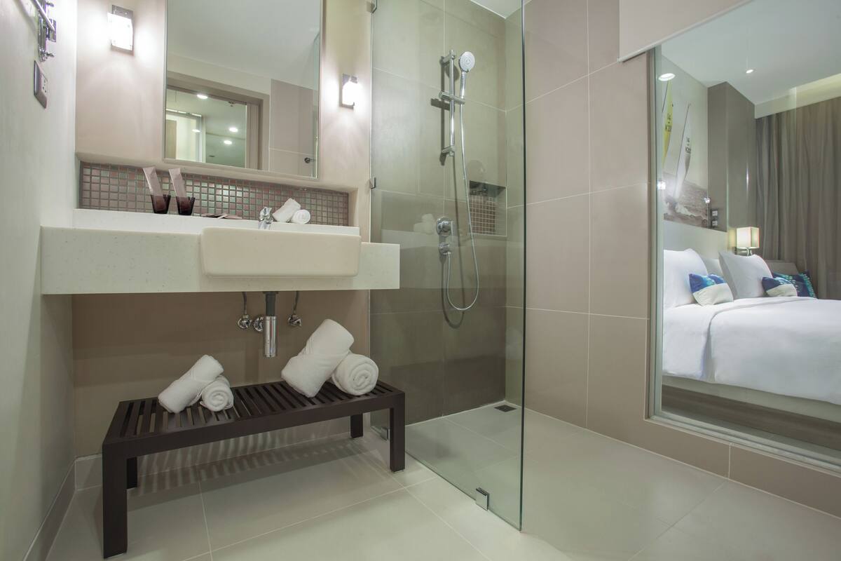 shower, eco-friendly toiletries, hair dryer, towels