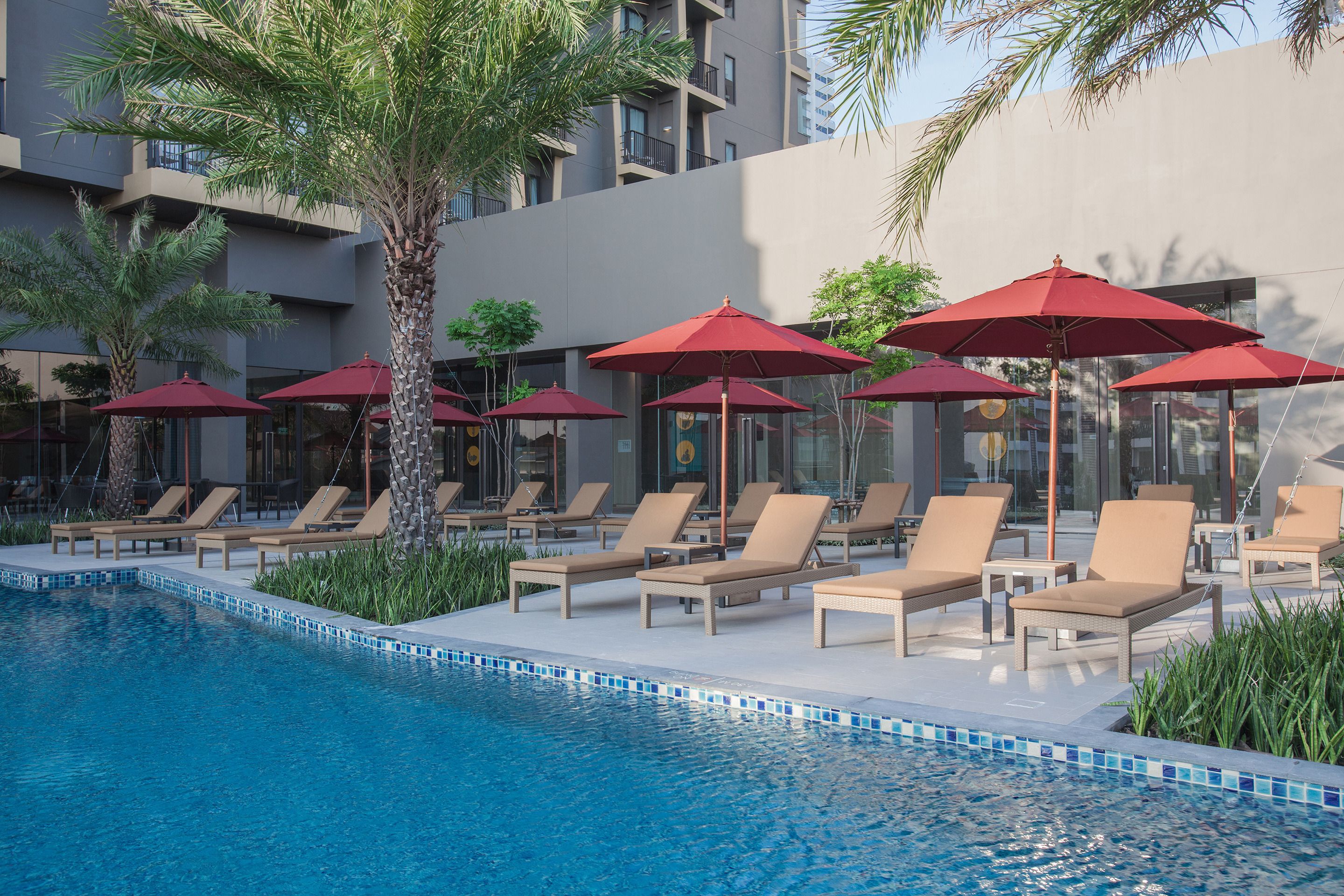 2 outdoor pools, pool umbrellas, pool loungers