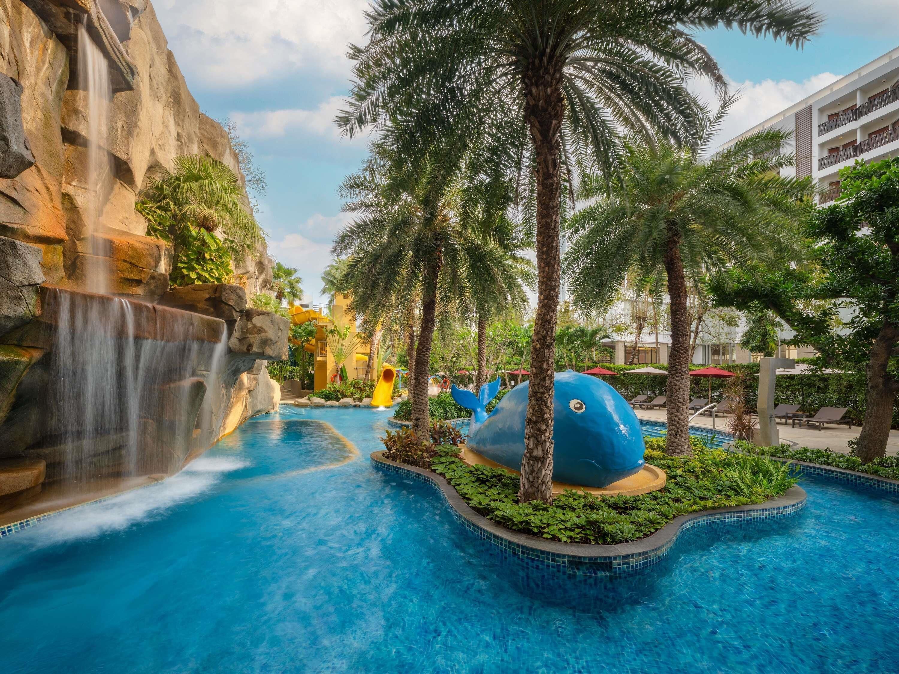 2 outdoor pools, pool umbrellas, pool loungers