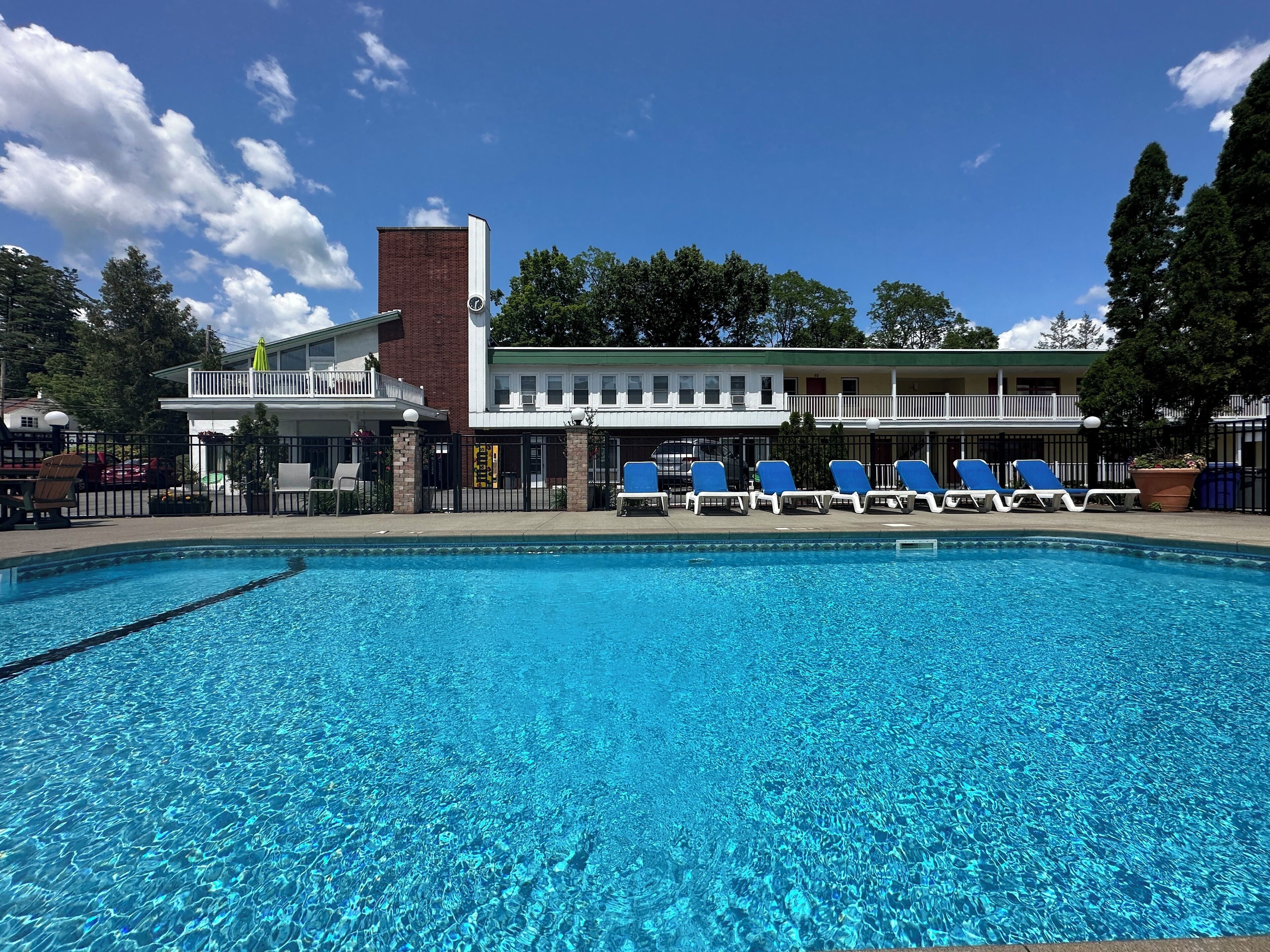 Outdoor pool, open 9 AM to 8 PM, pool umbrellas, sun loungers