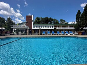 Outdoor pool, open 9 AM to 8 PM, pool umbrellas, sun loungers