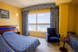 Cubrecamas, colchones con pillow-top y minibar 