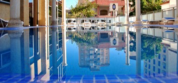 Seasonal outdoor pool, open 10:30 AM to 8:00 PM, sun loungers